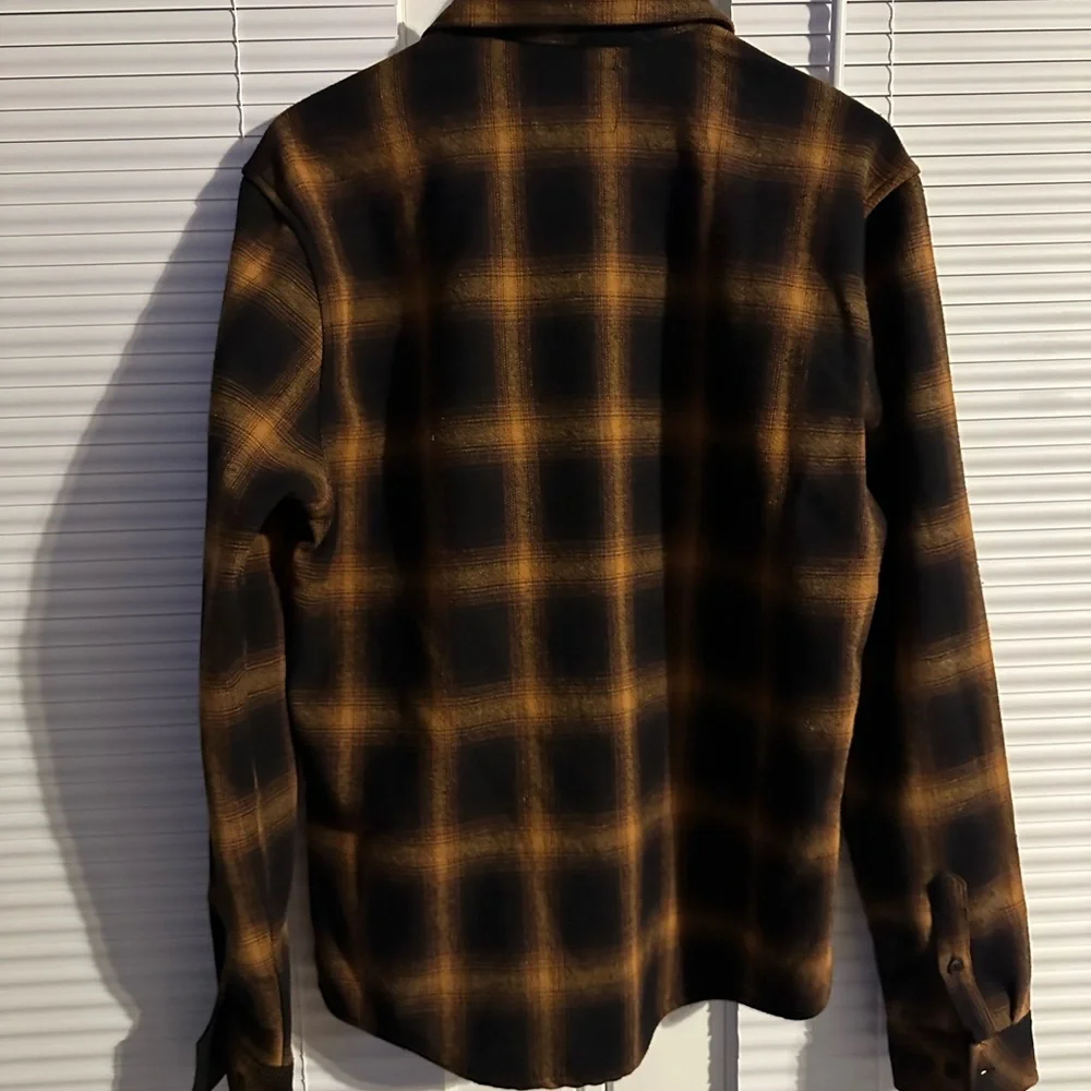 Nomad mens button